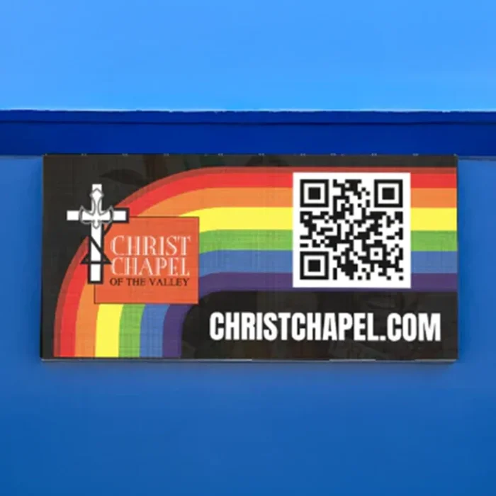 Wall-mounted LED display on a support frame at Christ Chapel of the Valley